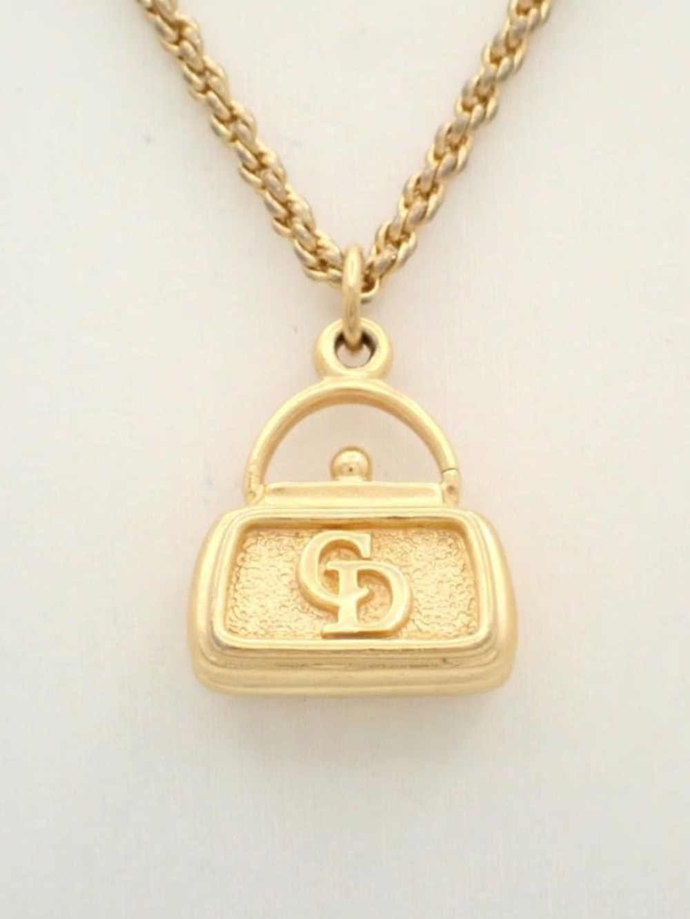 Christian Dior bag charm necklace